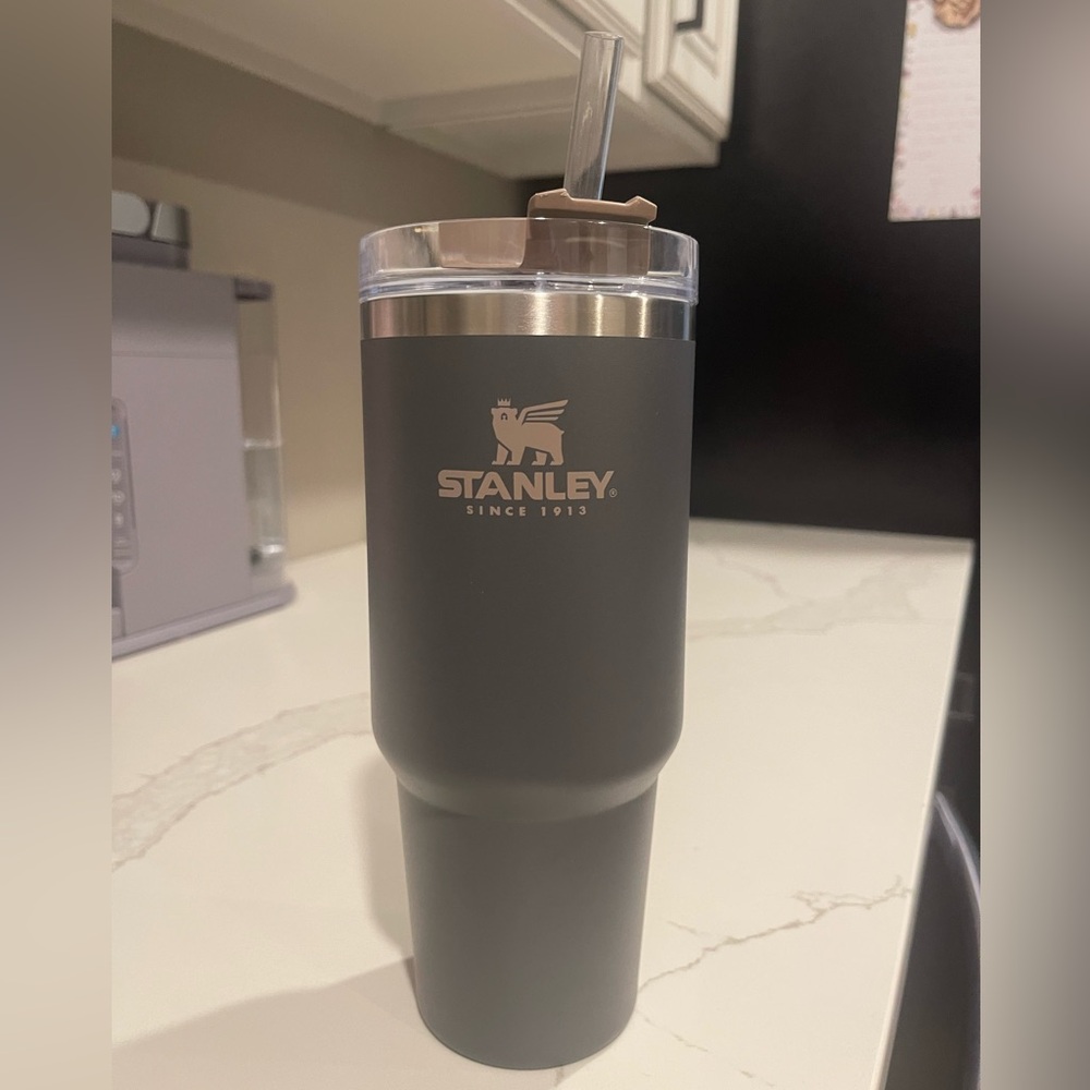 Stanley tumbler. Dark grey/ charcoal color.
